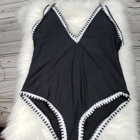 black one piece with white trim